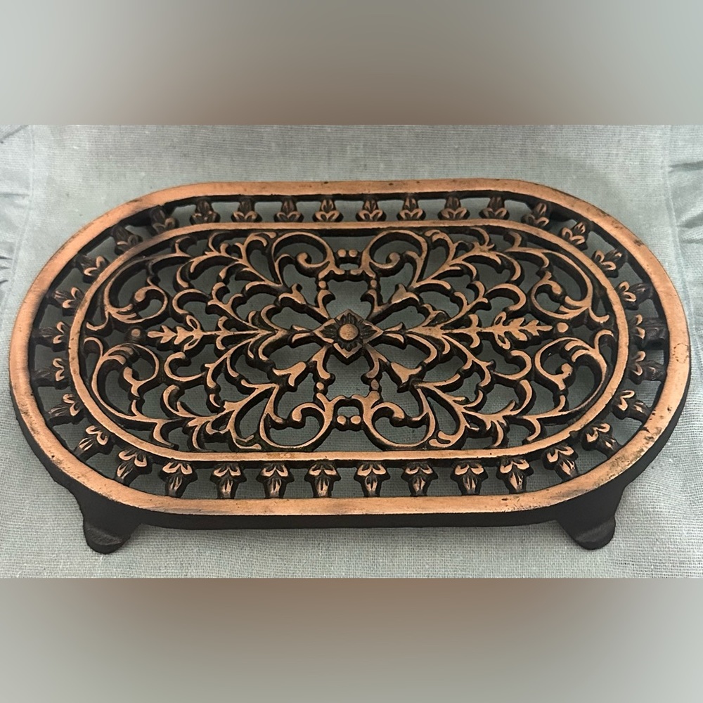 Beautiful heavy trivet 9.75" long and about a half inch tall